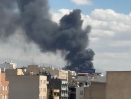 آتش سوزی در شریعتی تهران پس از بمباران هوایی